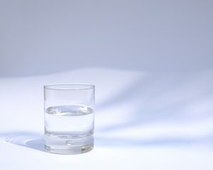Minum air putih - clear drinking glass filled with water